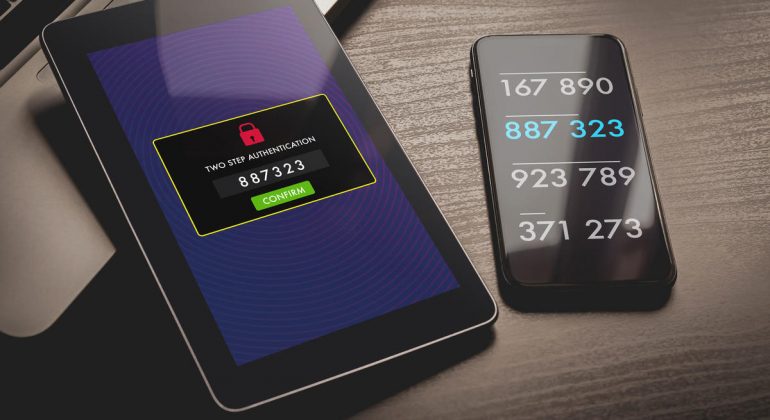 Two step authentication, 2-step Verification SMS code password concept. Smartphone with special 2FA software and tablet pc with multi-factor authentication safety and secure login form